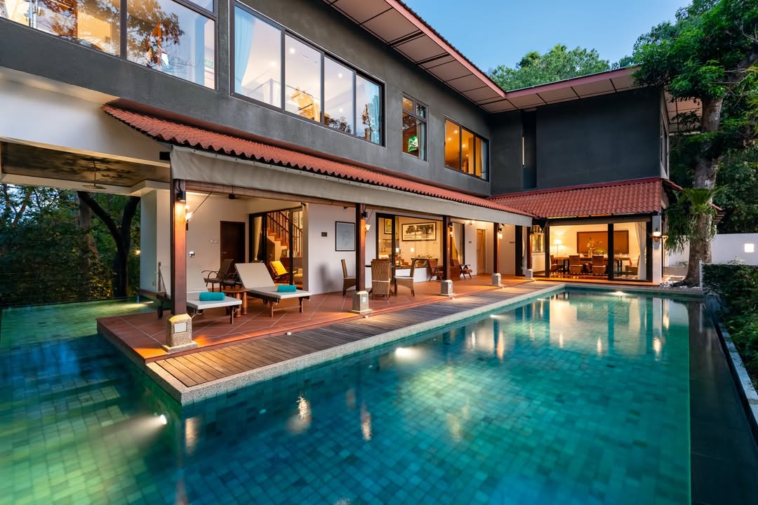 Ambong Pool Villas Langkawi featuring a luxurious private pool villa with a spacious infinity pool, modern tropical architecture, elegant outdoor lounge area, and a secluded rainforest setting near Pantai Tengah.